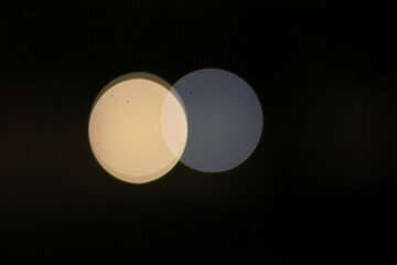 A vague image of a light in the night.