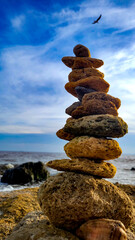 Sea stones in focus on the seashore.