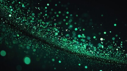 Green particles shimmer and move across a dark background, creating a mesmerizing and dynamic visual effect.