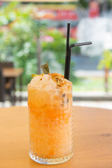 orange cocktail with ice