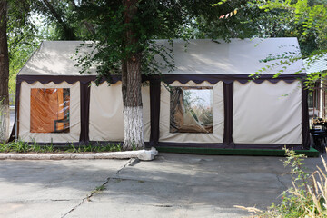 Summer cafe tent in the form of an open-air tent.