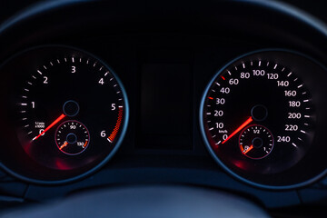 speedometer on black background