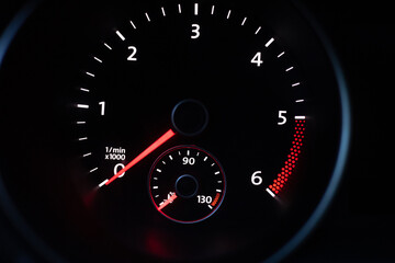 speedometer on black background