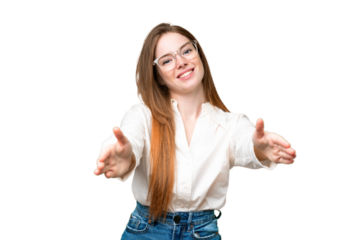 Young pretty woman over isolated chroma key background presenting and inviting to come with hand