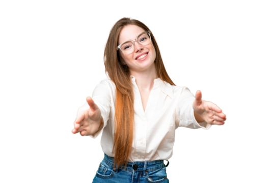 Young pretty woman over isolated chroma key background presenting and inviting to come with hand