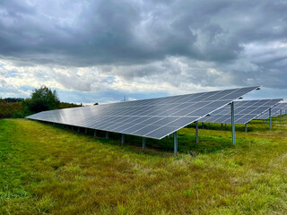 Clean energy against the backdrop of nature - solar panels and ecology