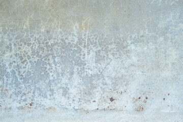 Blank, well worn concrete texture background. Gray, brown, red and blue variations of colors.