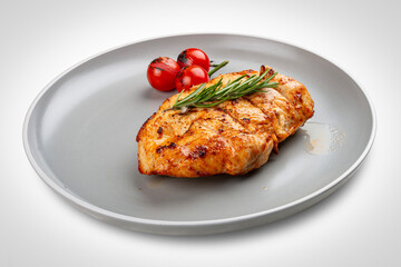 Grilled chicken breast with rosemary and cherry tomatoes