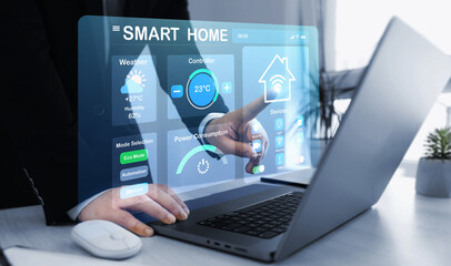 Technology assistant for smart devices,intelligent house or smart home technology.Business person using digital dashboard of smart home app for control home appliances. 