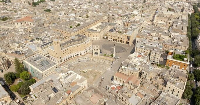Aerial view of Sant'Oronzo square, Palazzo del Seggio and the Roman amphitheater of Lecce, In Puglia, Italy. It is for the people of Lecce the main meeting place.