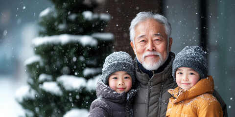 Obraz premium Happy grandfather hugging grandchildren who came to visit for Christmas holidays, poster with wishes for a merry Christmas and a happy New Year
