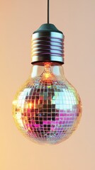 Disco ball light bulb on pastel background. Creative lighting and design concept