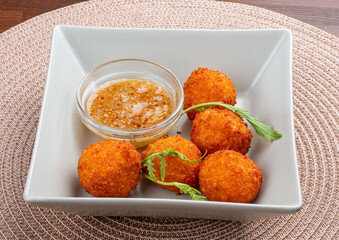 Fried cheese balls with honey-mustard sauce