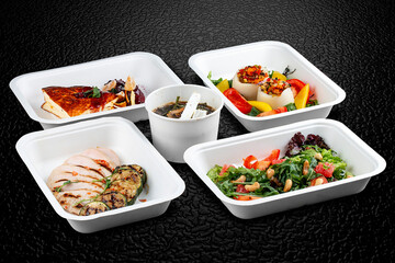 Fresh and flavorful dishes packed in eco-friendly containers for a healthy and convenient meal on the go.