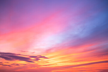 Obraz premium Beautiful , luxury soft gradient orange gold clouds and sunlight on the blue sky perfect for the background, take in everning,Twilight, Large size, high definition landscape photo