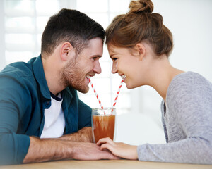 Holding hands, milkshake and cafe with couple on date for romance, bonding and care. Smoothie, coffee shop and care with man and woman sharing drink at restaurant for summer, break and relationship