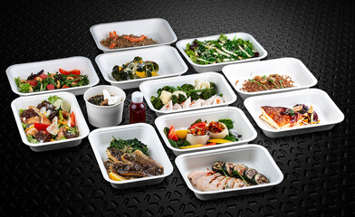 Fresh and flavorful dishes packed in eco-friendly containers for a healthy and convenient meal on the go.