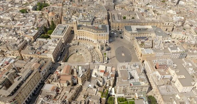 Aerial view of Sant'Oronzo square, Palazzo del Seggio and the Roman amphitheater of Lecce, In Puglia, Italy. It is for the people of Lecce the main meeting place.