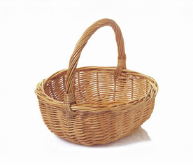 Obraz premium Empty wicker basket isolated on white background. Hand made Natural Wicker basket isolated