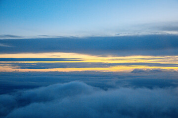China Shanghai - Sunrise above the clouds from the plane