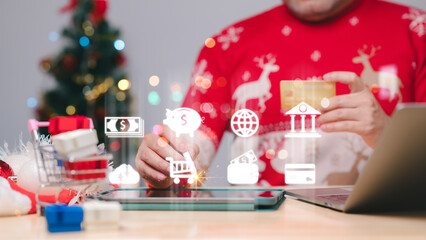 A cozy holiday scene showcasing a shopper using a tablet and credit card, surrounded by Christmas decorations, emphasizing the convenience of online shopping during the festive season