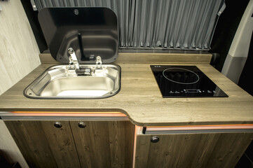 Comfortable interior of a passenger bus with soft seats. The design is made to order. Private...
