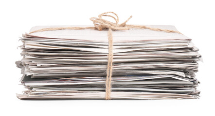 Stack of many newspapers isolated on white