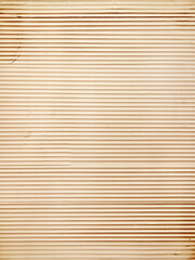 Obraz premium Beige cardboard background with horizontal stripes and small stains, vintage paper texture for design or print.