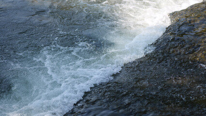 waves crashing on rocks