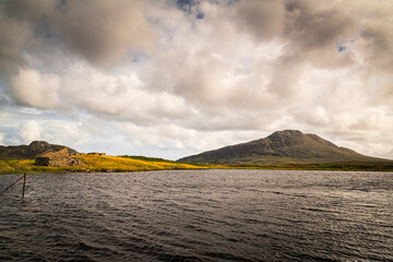 A summer HDR image of Eaval, Eabhal, across loch nighe near the end of road sculpture "Sanctuary", North Uist, Outer Hebrides, Scotland. © espy3008