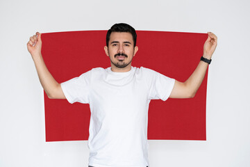 Moustached man holding Vietnam flag, campaigning concept, patriot and nationalist person