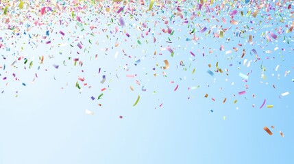 Colorful confetti raining down on a bright blue background during a festive celebration