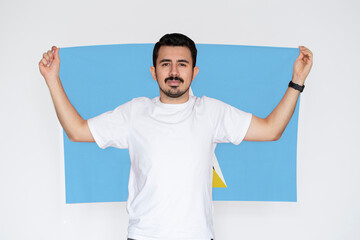 Moustached man holding Saint Lucia flag, campaigning concept, patriot and nationalist person