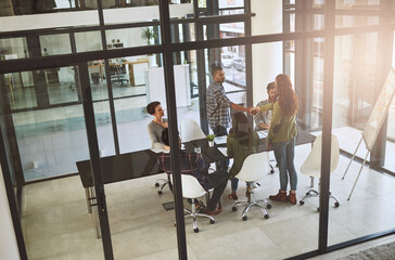 Employees, shaking hands and introduction in boardroom with client, negotiation and acquisition. Businesspeople, meeting and thanks for presentation at sales agency, onboarding welcome and high angle