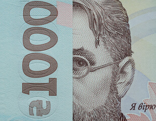 a thousand hryvnia are looking at you carefully