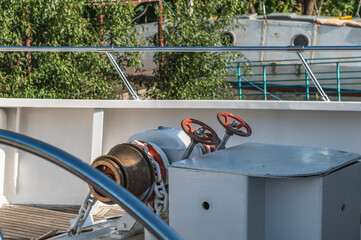 A boat at the pier of the yacht club 