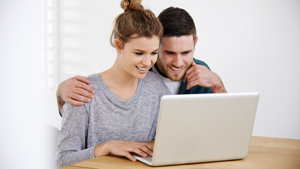 Smile, home or couple on laptop for choice, reading online article on interior design website. Hug, house rental option or happy people typing on technology for renovation research, mortgage or loan