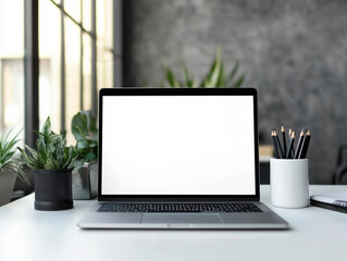 Laptop PC mock up template design on office workplace desk, white blank screen on modern workspace table. Business web technology setup in professional workspace for digital projects and online work.