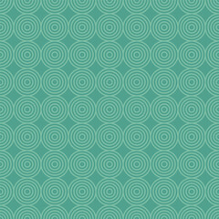 A repeating pattern of concentric circles on a turquoise background, suitable for design and decor.