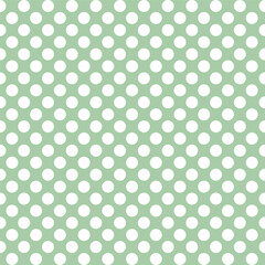 A seamless pattern of white circles on a soft green background, ideal for fabric or wallpaper design.