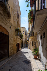 Charming narrow street in the old town of Bari, Puglia, Italy