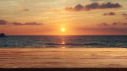 A serene sunset over the ocean, viewed from a wooden table.