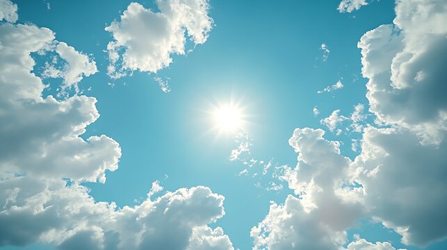 Bottom up view of blue sky with shining sun White fluffy clouds on a blue sky in spring season : Generative AI