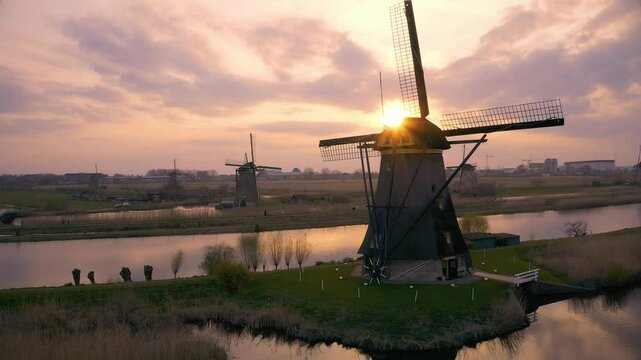 aerial view of windmills  at river lek in kinderdijk during sunset in 4K in 4K