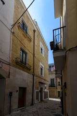 Fototapeta premium Charming narrow street in the old town of Bari, Puglia, Italy