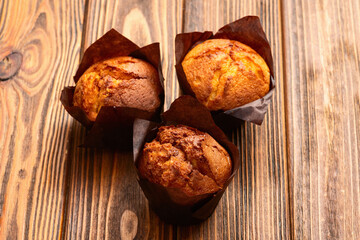Sweet Baked vanilla muffins ( cupcake )  . Top view