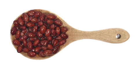 Cooked black beans in wooden spoon isolated on white background, top view