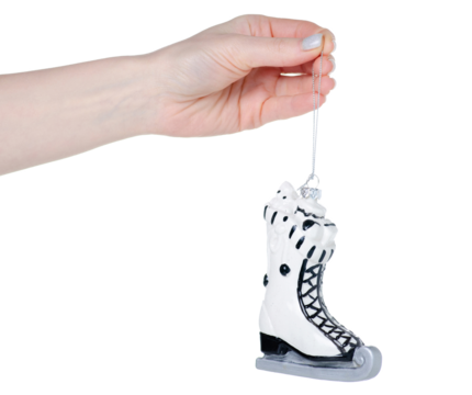Christmas toy skates in hand isolation