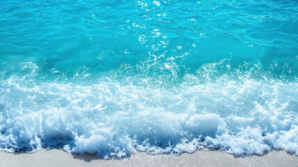 Obraz premium Vibrant turquoise ocean waves with frothy foam and a textured water surface