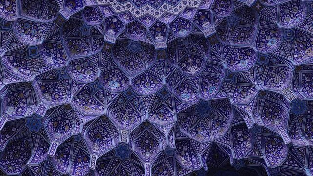 Ceiling at Imam Mosque, arch at the entrance, Naghsh-e Jahan Square, Isfahan, Iran. Beautiful oldest iranian mosque interior design. Unique mosaics and ornaments. A masterpiece of Persian architecture